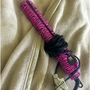 Brand: style house (amazon) Description : Pink zebra striped straightener
